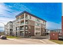 4307-111 Wolf Creek Drive Se, Calgary, AB  - Outdoor With Facade 