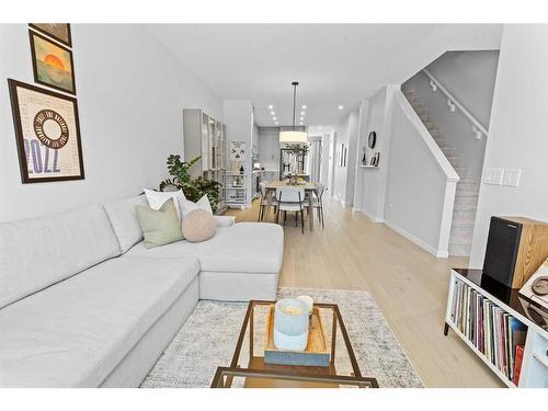 57 Edith Gate Nw, Calgary, AB - Indoor Photo Showing Living Room