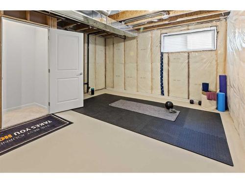 57 Edith Gate Nw, Calgary, AB - Indoor Photo Showing Basement