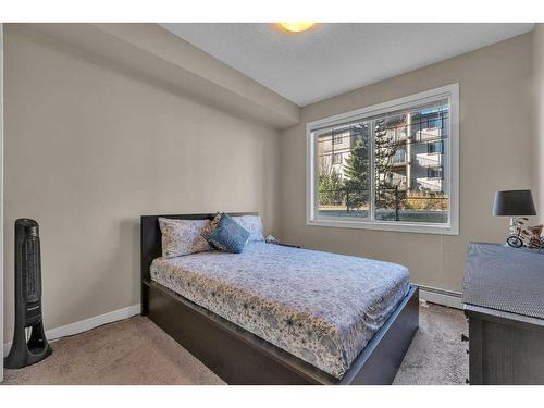 106-76 Panatella Road Nw, Calgary, AB - Indoor Photo Showing Bedroom