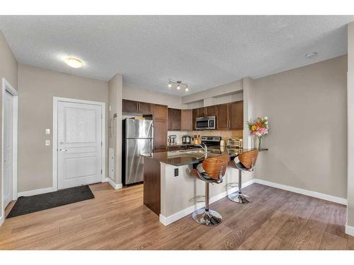 106-76 Panatella Road Nw, Calgary, AB - Indoor Photo Showing Kitchen