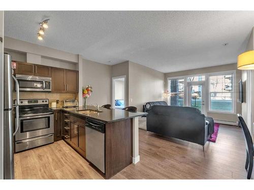 106-76 Panatella Road Nw, Calgary, AB - Indoor Photo Showing Kitchen