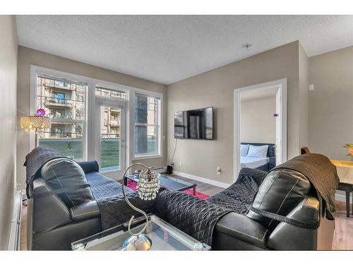 106-76 Panatella Road Nw, Calgary, AB - Indoor Photo Showing Living Room