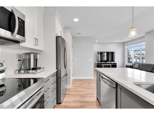 402 Seton Passage Se, Calgary, AB - Indoor Photo Showing Kitchen With Stainless Steel Kitchen With Upgraded Kitchen