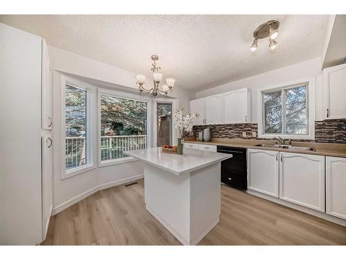 222 Cedarwood Park Sw, Calgary, AB - Indoor Photo Showing Kitchen With Double Sink