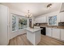 222 Cedarwood Park Sw, Calgary, AB  - Indoor Photo Showing Kitchen With Double Sink 