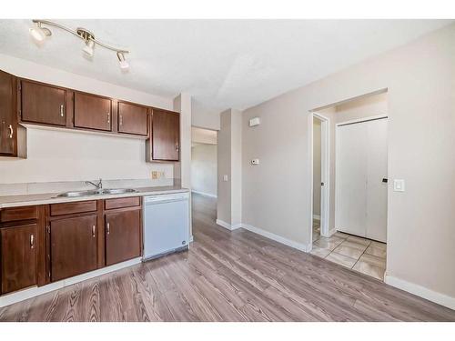 14 Midridge Gardens Se, Calgary, AB - Indoor Photo Showing Kitchen With Double Sink