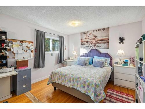 9116 Academy Drive Se, Calgary, AB - Indoor Photo Showing Bedroom