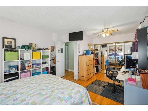 9116 Academy Drive Se, Calgary, AB - Indoor Photo Showing Bedroom