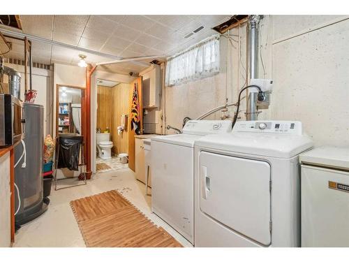 9116 Academy Drive Se, Calgary, AB - Indoor Photo Showing Laundry Room