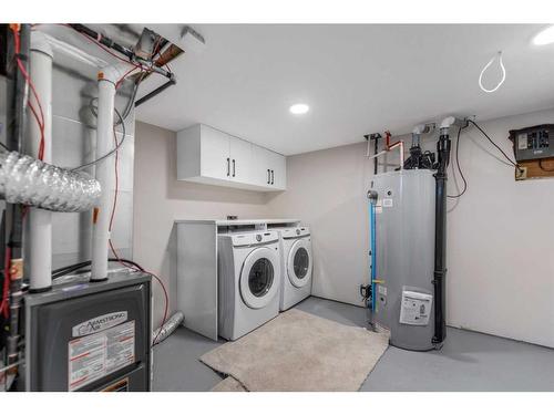 171 Maple Court Crescent Se, Calgary, AB - Indoor Photo Showing Laundry Room