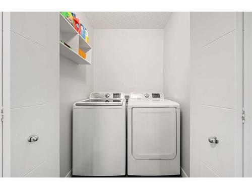 262 Fireside Drive, Cochrane, AB - Indoor Photo Showing Laundry Room