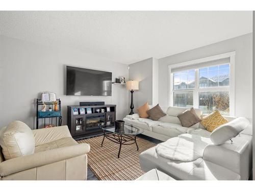 262 Fireside Drive, Cochrane, AB - Indoor Photo Showing Living Room