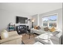 262 Fireside Drive, Cochrane, AB  - Indoor Photo Showing Living Room 