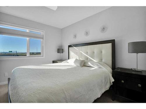 884 Seton Circle Se, Calgary, AB - Indoor Photo Showing Bedroom