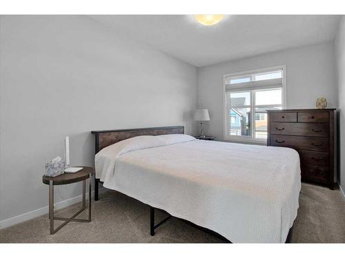 884 Seton Circle Se, Calgary, AB - Indoor Photo Showing Bedroom