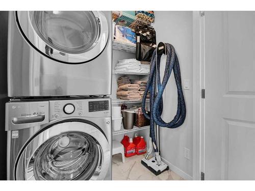 884 Seton Circle Se, Calgary, AB - Indoor Photo Showing Laundry Room