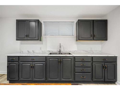 400 Kincora Drive Nw, Calgary, AB - Indoor Photo Showing Kitchen With Double Sink