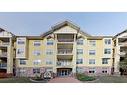 105-2212 34 Avenue Sw, Calgary, AB  - Outdoor With Balcony With Facade 