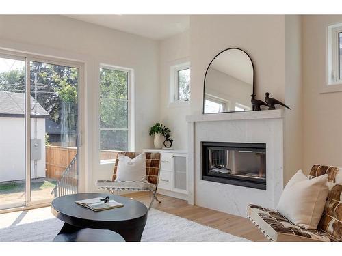 1635 Bowness Road Nw, Calgary, AB - Indoor Photo Showing Living Room With Fireplace