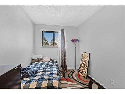 42 Templeby Way Ne, Calgary, AB - Indoor Photo Showing Bedroom