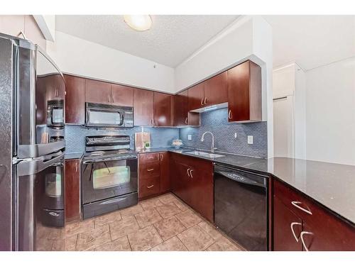 1107-8710 Horton Road, Calgary, AB - Indoor Photo Showing Kitchen