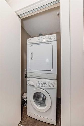 1107-8710 Horton Road, Calgary, AB - Indoor Photo Showing Laundry Room