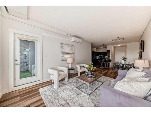 1107-8710 Horton Road, Calgary, AB - Indoor Photo Showing Living Room