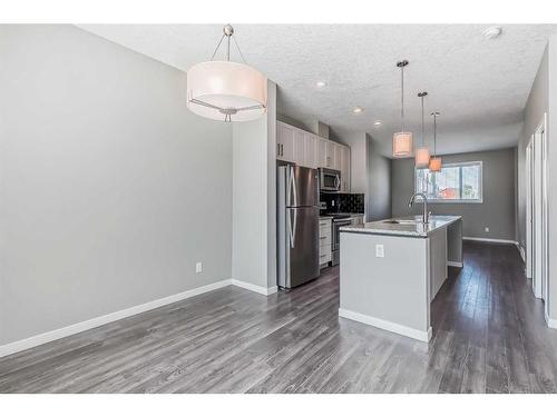 688 Copperpond Boulevard Se, Calgary, AB - Indoor Photo Showing Kitchen