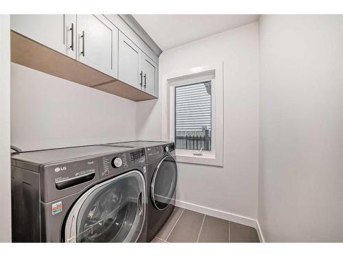 35 Mckinley Road Se, Calgary, AB - Indoor Photo Showing Laundry Room