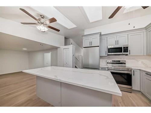 35 Mckinley Road Se, Calgary, AB - Indoor Photo Showing Kitchen