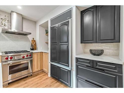 116 Canterbury Place Sw, Calgary, AB - Indoor Photo Showing Kitchen With Upgraded Kitchen