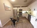 212-1507 Centre A Street Ne, Calgary, AB  - Indoor Photo Showing Kitchen With Stainless Steel Kitchen With Double Sink 