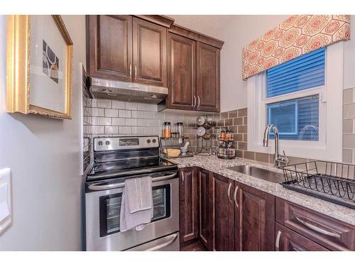 13 Savanna Green Ne, Calgary, AB - Indoor Photo Showing Kitchen