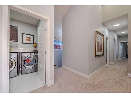 13 Savanna Green Ne, Calgary, AB - Indoor Photo Showing Laundry Room