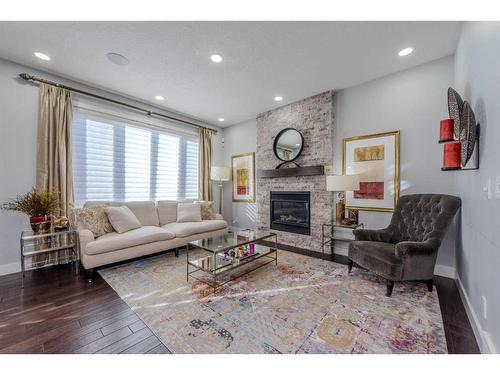 13 Savanna Green Ne, Calgary, AB - Indoor Photo Showing Living Room With Fireplace