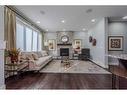 13 Savanna Green Ne, Calgary, AB  - Indoor Photo Showing Living Room With Fireplace 