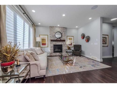 13 Savanna Green Ne, Calgary, AB - Indoor Photo Showing Living Room With Fireplace