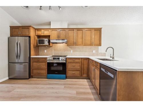 22 West Springs Court Sw, Calgary, AB - Indoor Photo Showing Kitchen With Double Sink