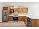 22 West Springs Court Sw, Calgary, AB  - Indoor Photo Showing Kitchen With Double Sink 