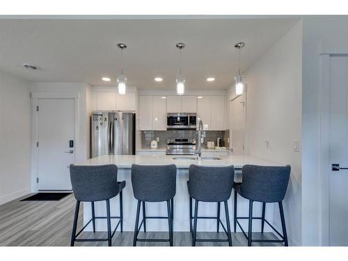 400 Seton Passage Se, Calgary, AB - Indoor Photo Showing Kitchen With Stainless Steel Kitchen With Upgraded Kitchen