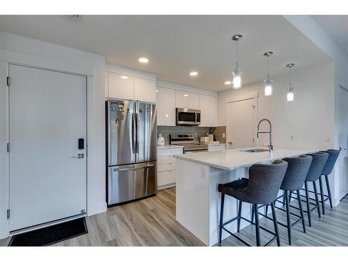 400 Seton Passage Se, Calgary, AB - Indoor Photo Showing Kitchen With Stainless Steel Kitchen With Upgraded Kitchen