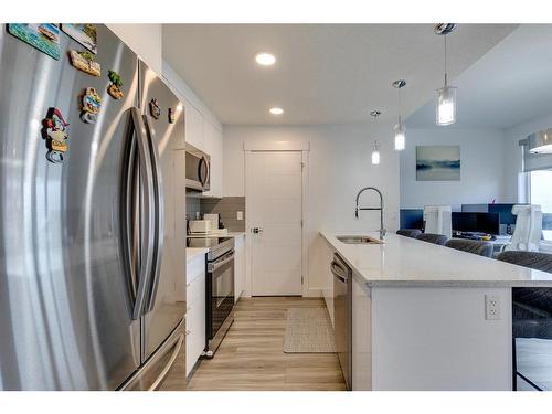 400 Seton Passage Se, Calgary, AB - Indoor Photo Showing Kitchen With Stainless Steel Kitchen With Upgraded Kitchen