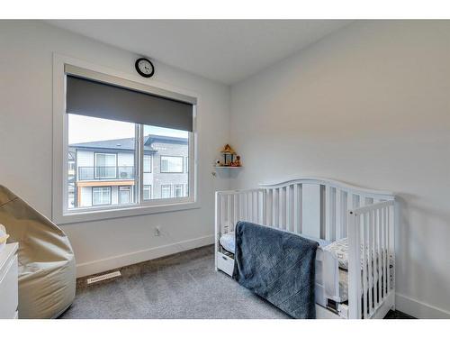 400 Seton Passage Se, Calgary, AB - Indoor Photo Showing Bedroom