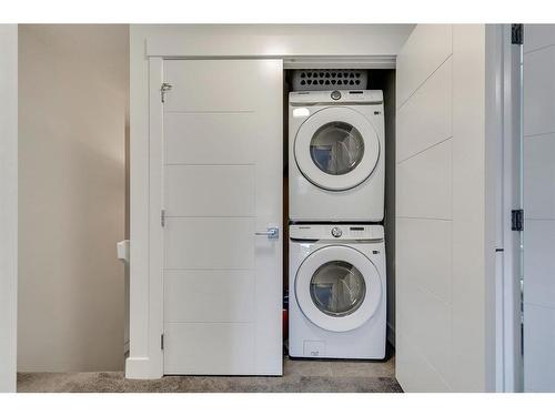 400 Seton Passage Se, Calgary, AB - Indoor Photo Showing Laundry Room