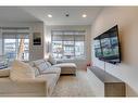 400 Seton Passage Se, Calgary, AB  - Indoor Photo Showing Living Room 