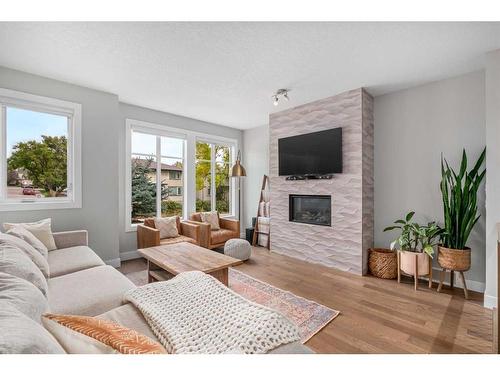 2343 22 Avenue Sw, Calgary, AB - Indoor Photo Showing Living Room With Fireplace