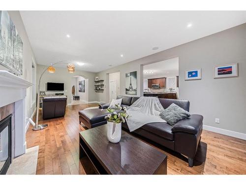 190 Windridge Road Sw, Airdrie, AB - Indoor Photo Showing Living Room With Fireplace