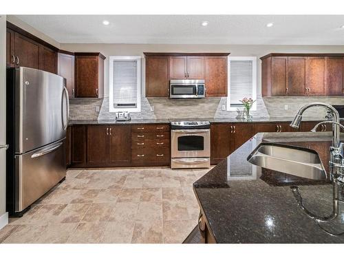 190 Windridge Road Sw, Airdrie, AB - Indoor Photo Showing Kitchen With Double Sink