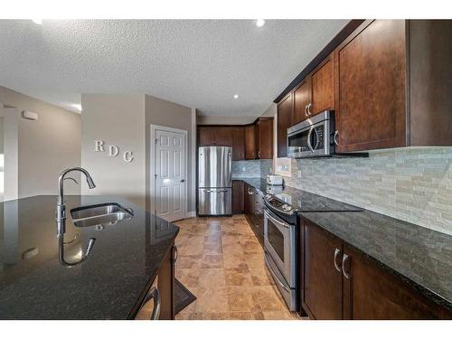 190 Windridge Road Sw, Airdrie, AB - Indoor Photo Showing Kitchen